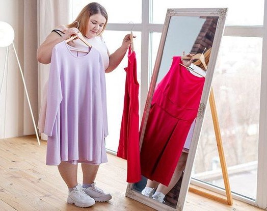 plus size woman Comparing dress styles to find the most comfortable fit