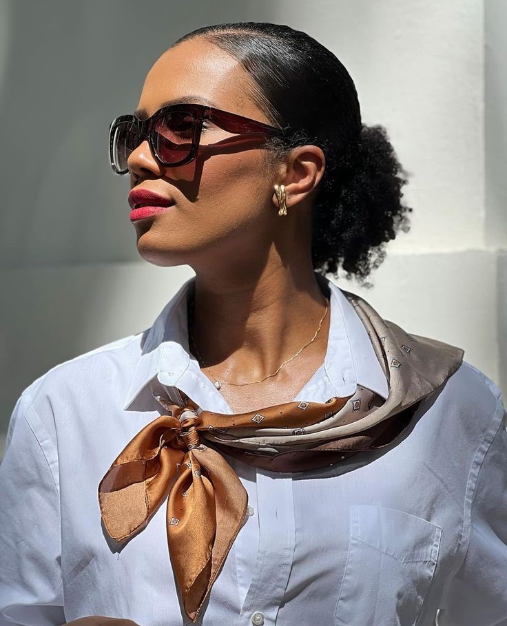 Lightweight scarf adding style to a plus size professional outfit