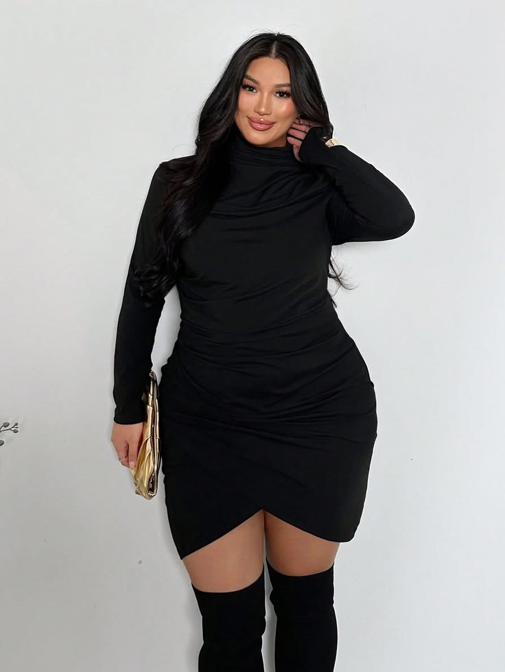 Plus size long sleeve little black dress styled for cooler weather.