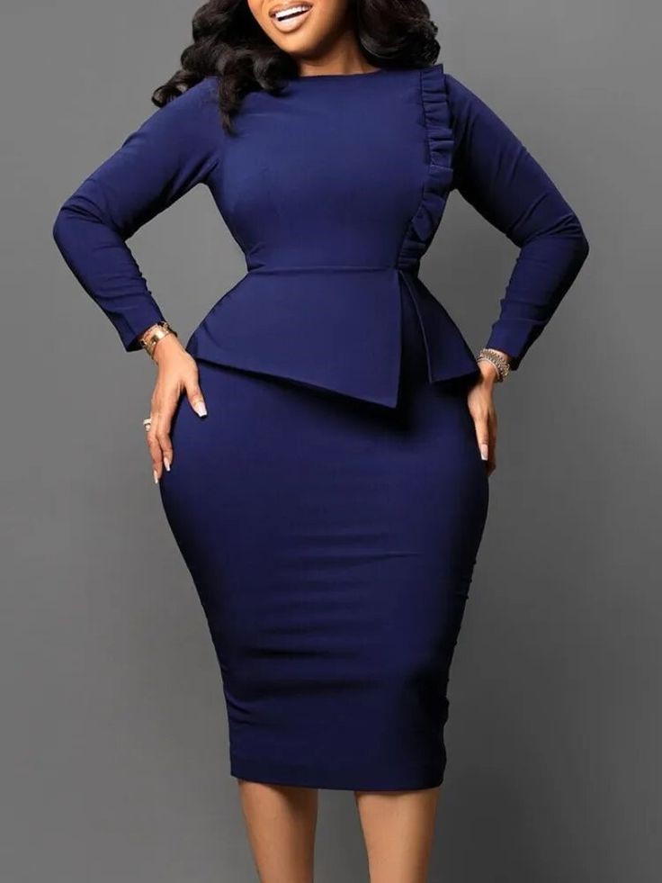 Curvy woman wearing a peplum midi dress with a defined waist and elegant silhouette.