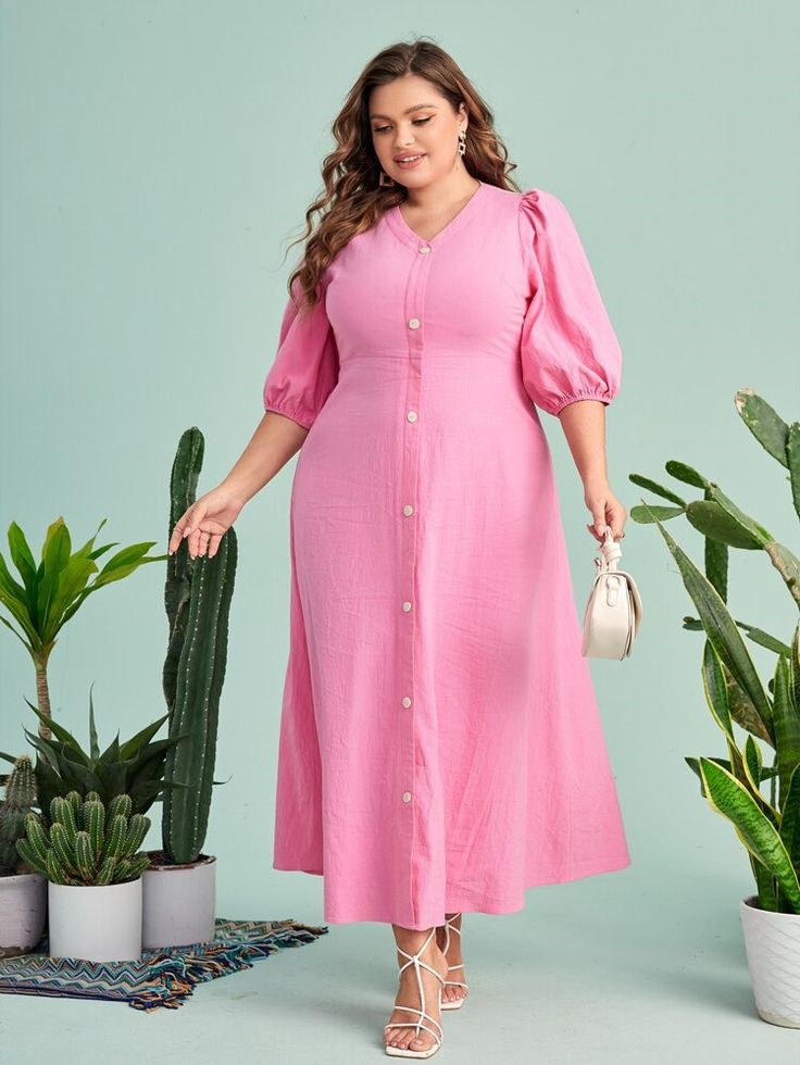 Plus size button-front maxi dress with a relaxed, everyday design.