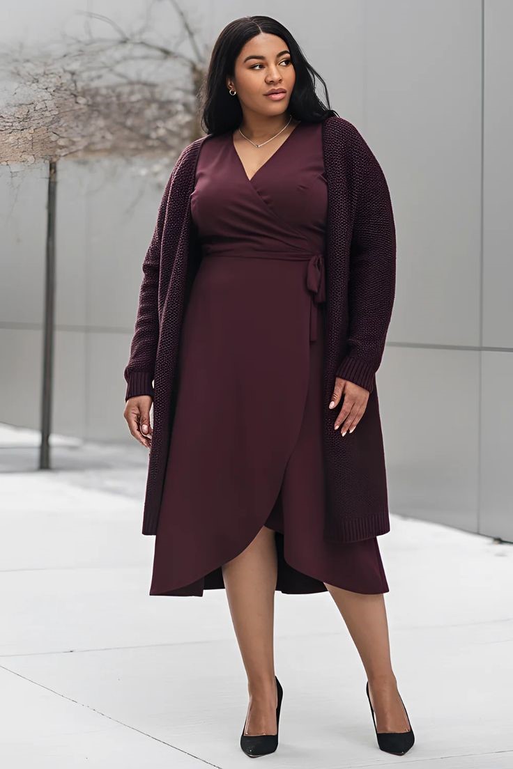 lus size woman wearing a cardigan over a midi dress for a comfortable office outfitP