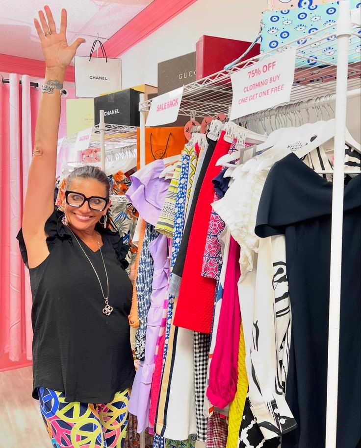 Plus-size woman browsing a clearance rack for affordable fashion deals