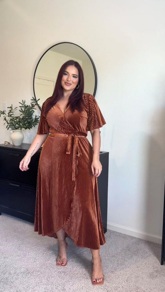 Plus size woman wearing an elegant midi dress styled for everyday fashion.