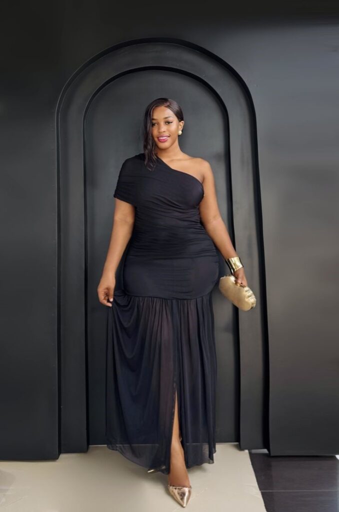 Elegant plus size one-shoulder maxi dress with a flowing skirt.