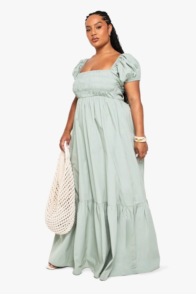 Plus size puff sleeve maxi dress with a flowing floor-length silhouette.