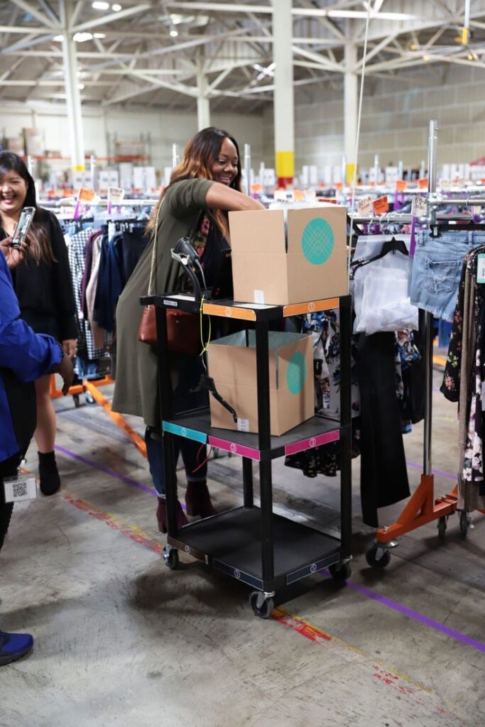Plus-size woman shopping for affordable clothing during a seasonal sale