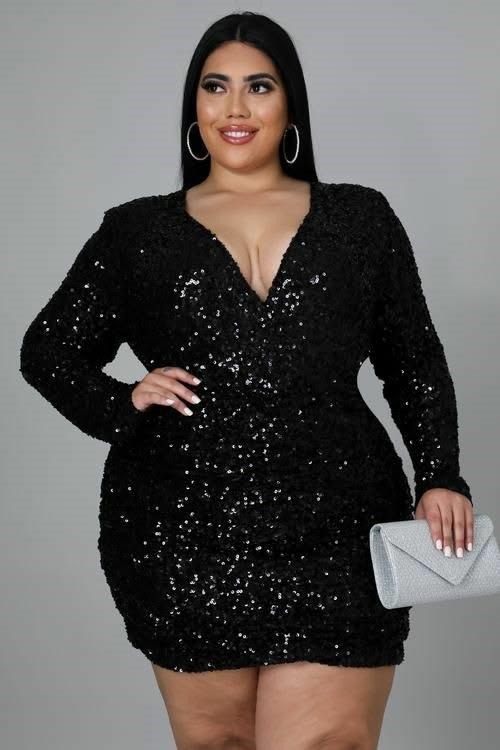 Plus size woman wearing a sparkling sequin little black dress for a party