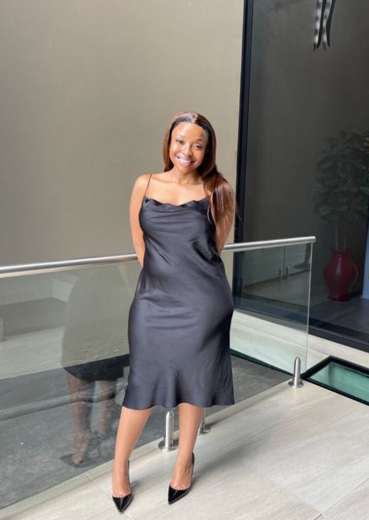 Curvy woman styling a slip midi dress 