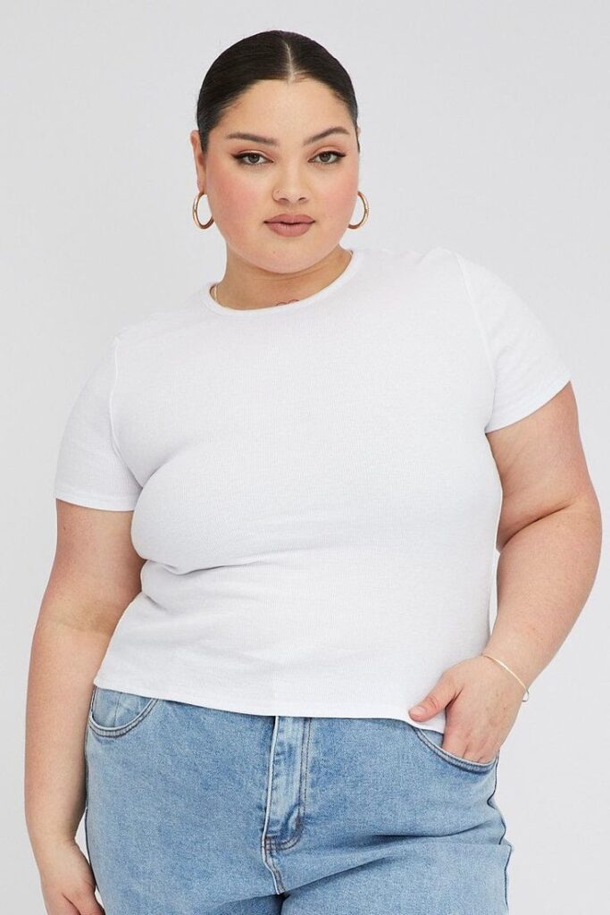 Structured white T-shirt styled for a plus size business casual outfit