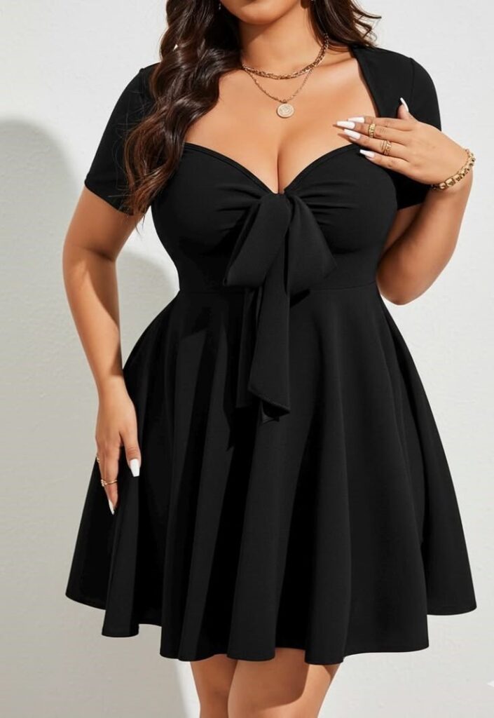 Black A-line dress with a defined waist flattering for a plus size woman