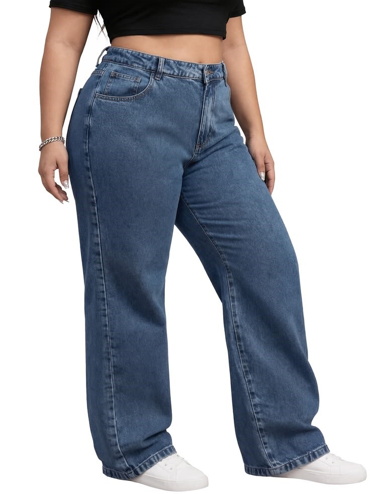 High-waisted jeans showing room around the hips and thighs