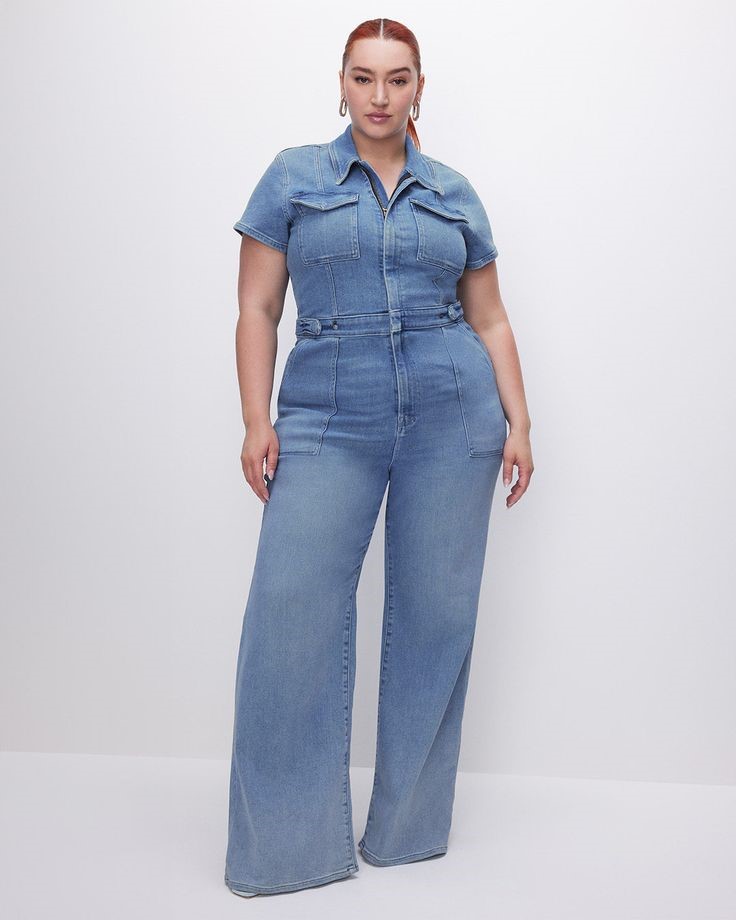 Woman wearing a Good American denim jumpsuit