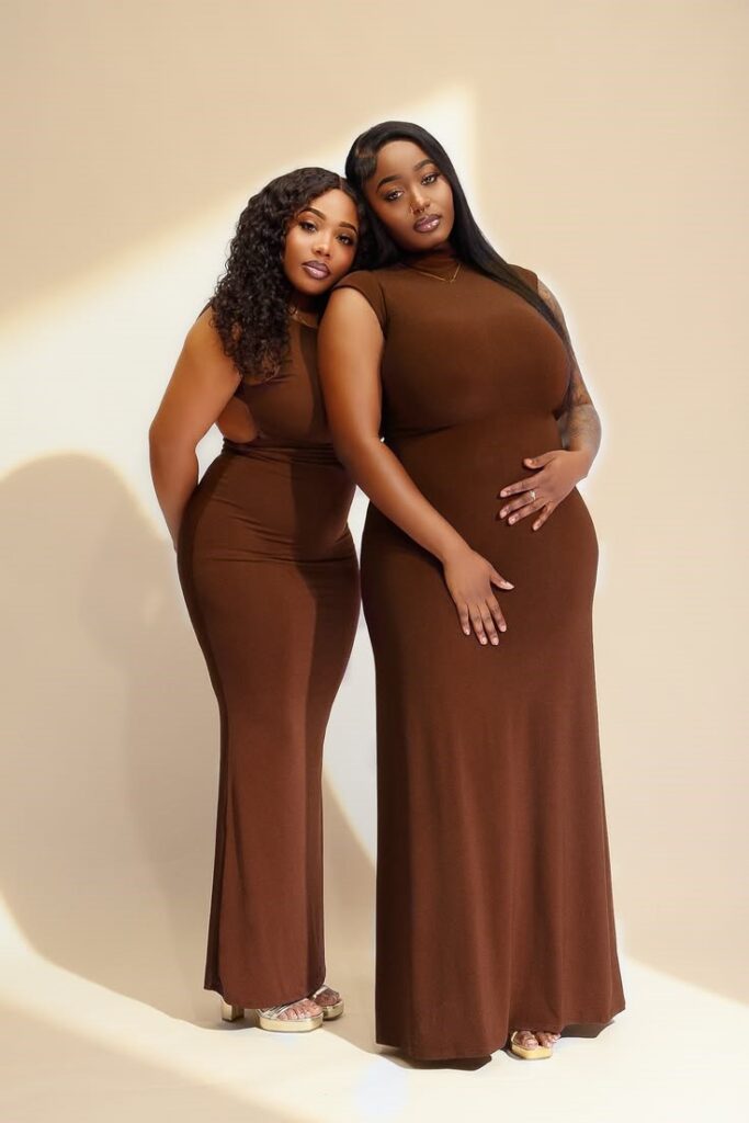Two plus-size women with different body proportions featured in a pear shape vs apple shape style guide.