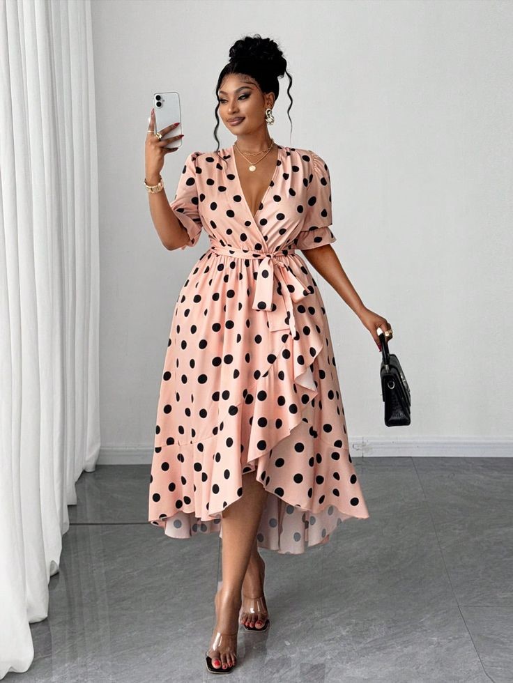 A woman wearing a flattering wrap dress 