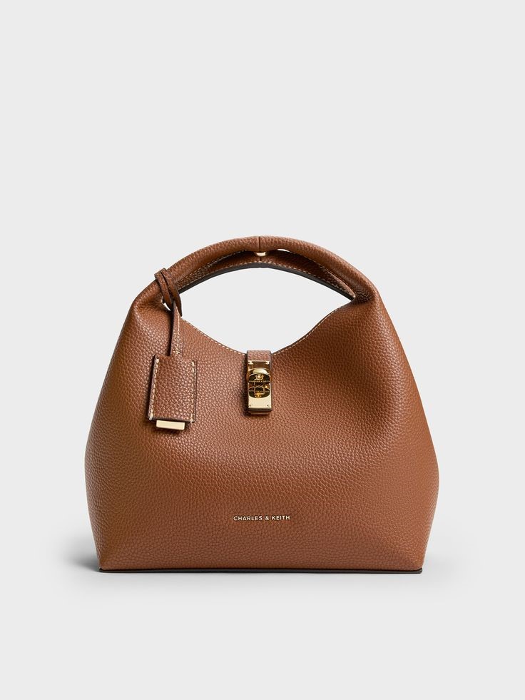 Structured brown handbag that instantly upgrades any outfit