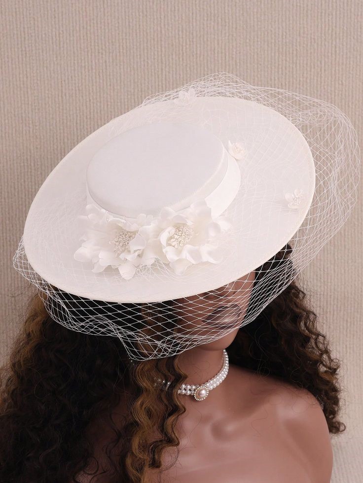 White statement hat for accessories that instantly upgrade any outfit