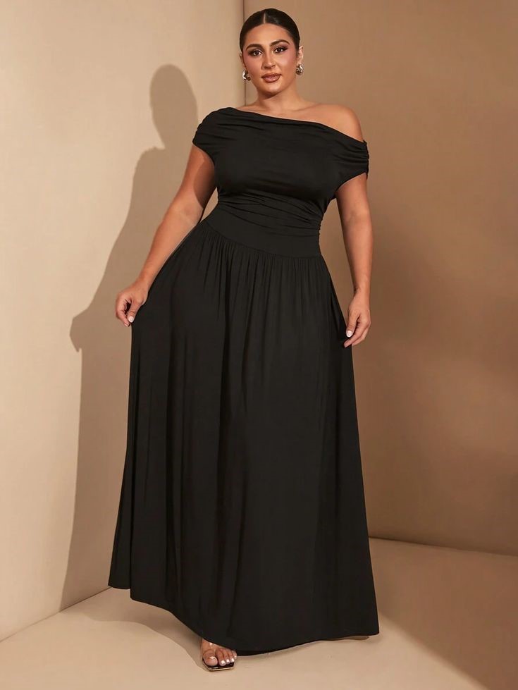 Black off-shoulder maxi dress for a wedding guest