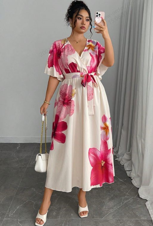 Bridal shower outfit ideas for plus size women featuring a romantic floral midi dress