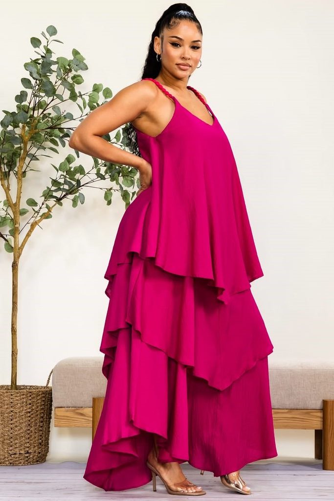 Bridal shower outfit ideas for plus size women featuring a pink tiered maxi dress