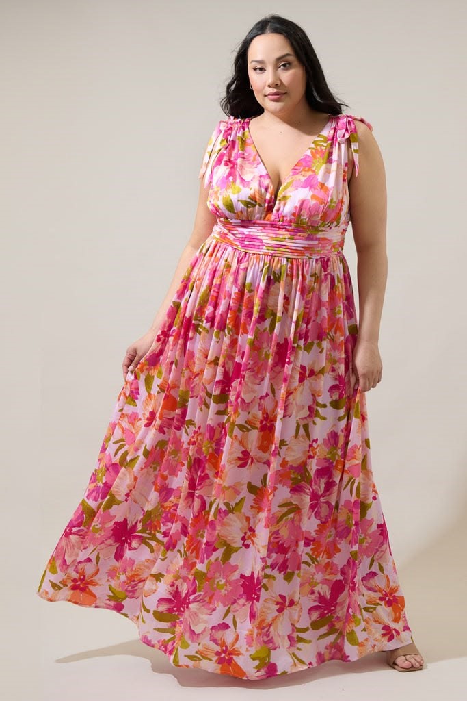 Bridal shower outfit ideas for plus size women featuring a romantic floral maxi dress