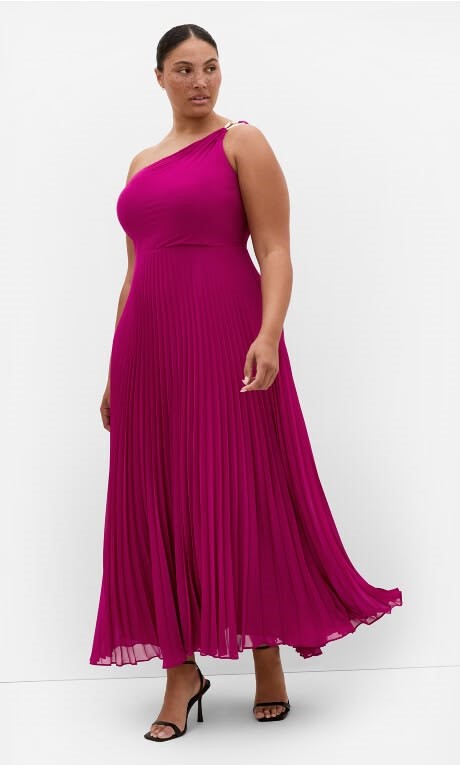 Bright pink one-shoulder maxi dress for a wedding guest