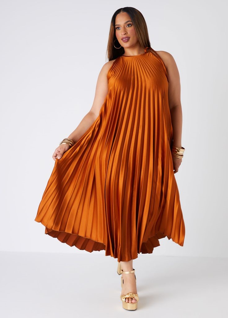 Burnt orange pleated maxi dress for a wedding guest