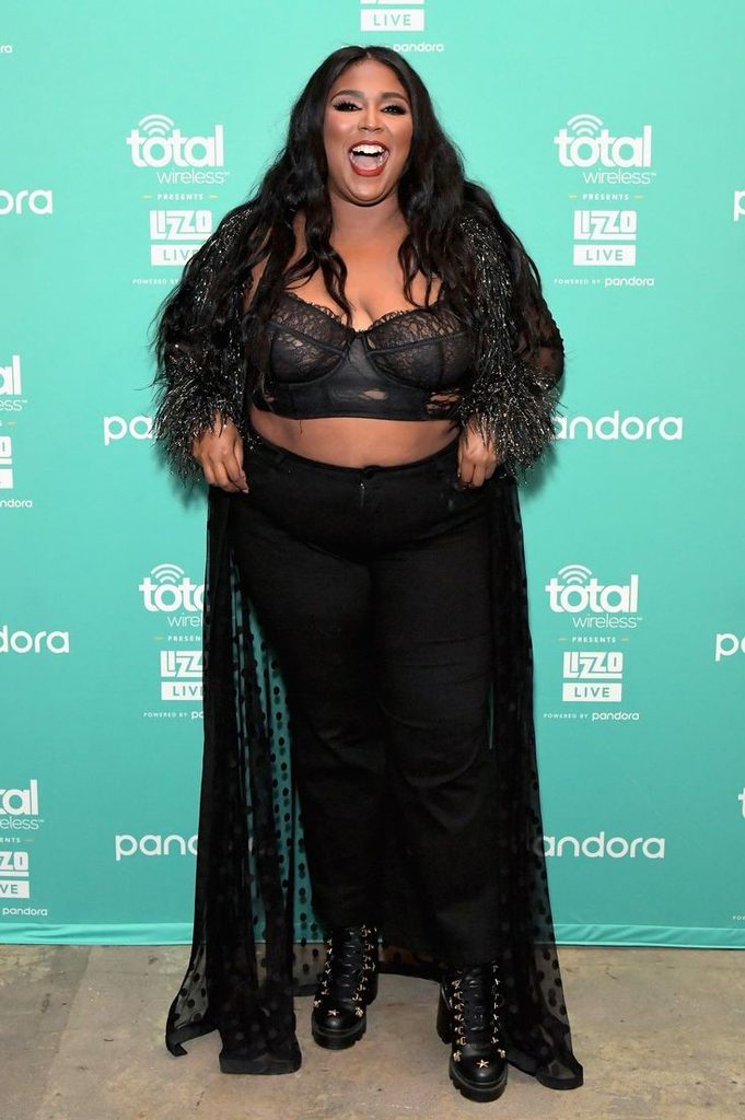 Lizzo wearing a bold and unapologetic celebrity plus size look