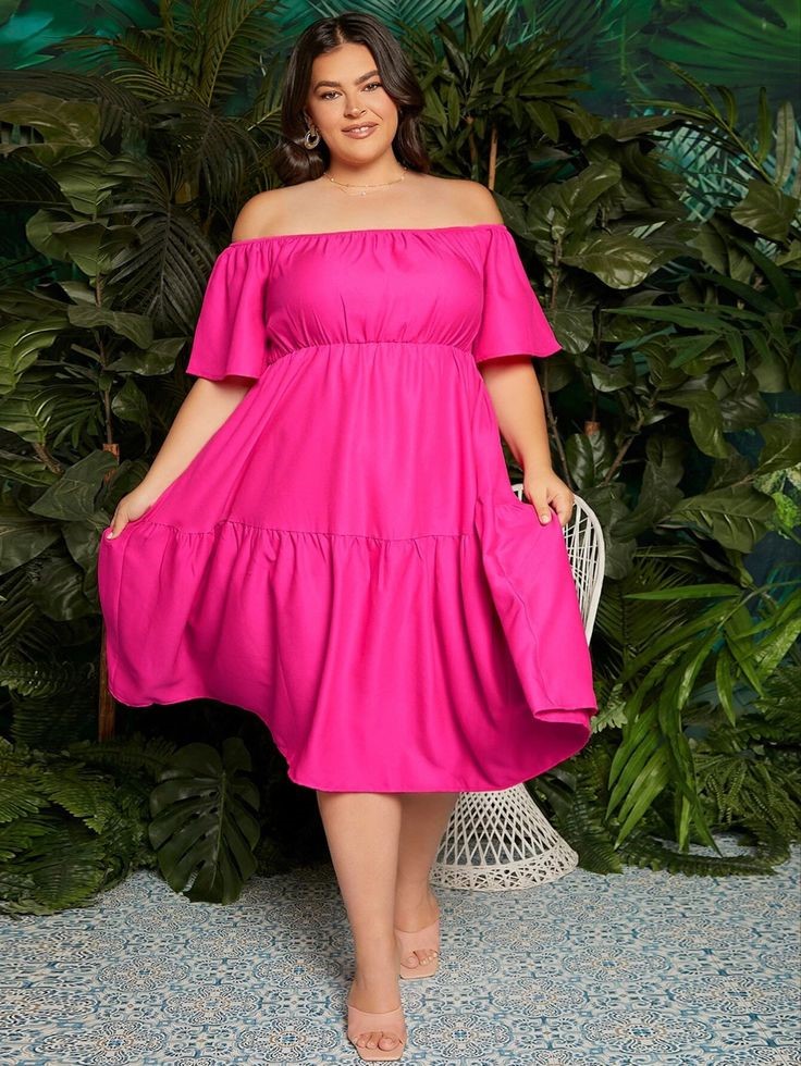 Bright coral off-shoulder midi dress for a wedding guest
