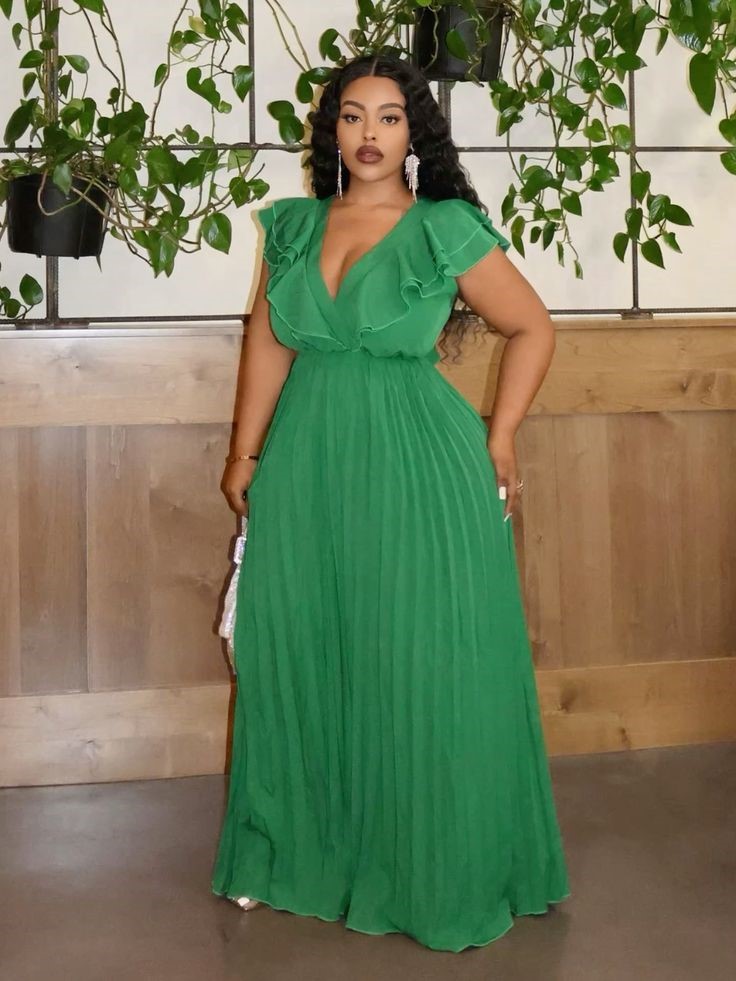 Emerald green pleated maxi dress for a wedding guest