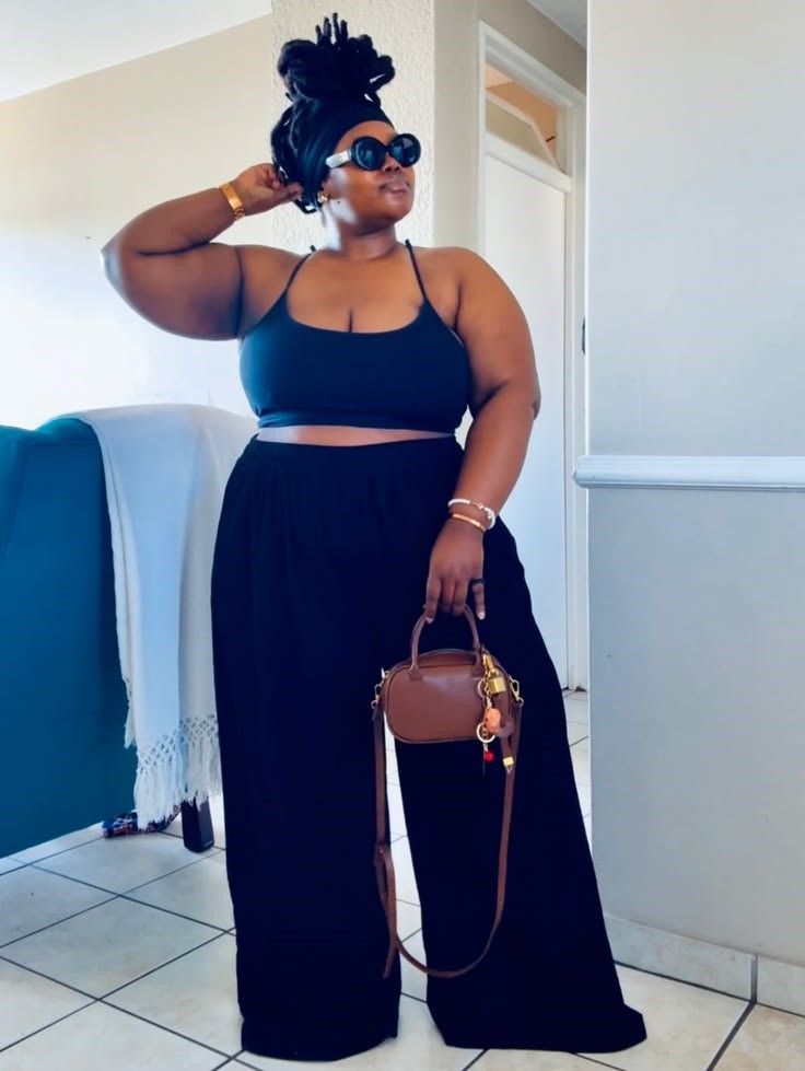 Plus size woman feeling beautiful in every outfit with balanced proportions