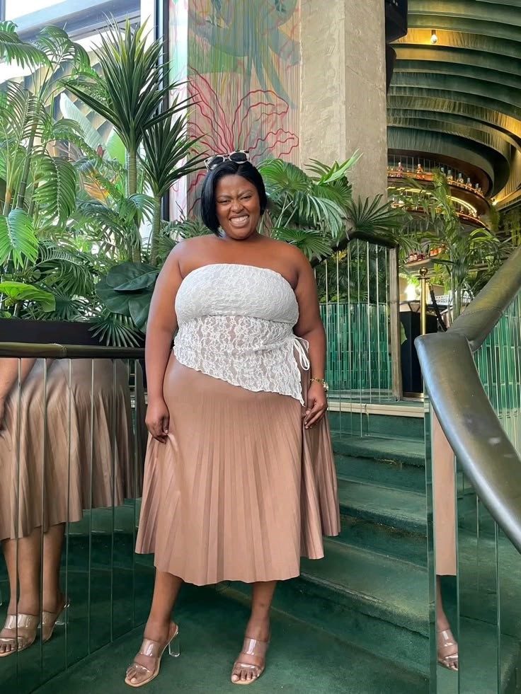 Plus size woman feeling beautiful in every outfit with a defined waistline