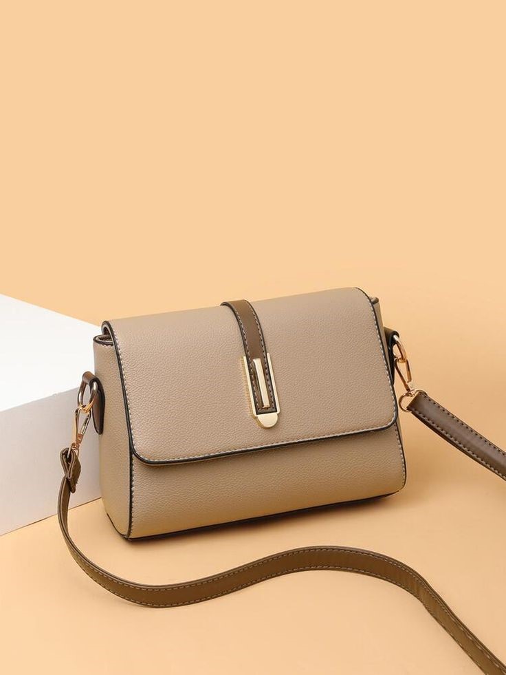 Beige neutral crossbody handbag that goes with everything for casual and everyday outfits