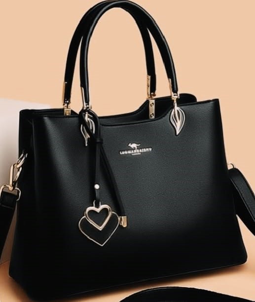 Black structured work tote, one of the handbags that go with everything for professional and everyday outfits