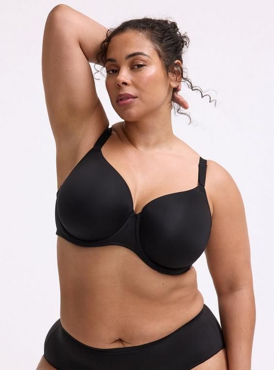 Plus size woman wearing a supportive bra that actually fits