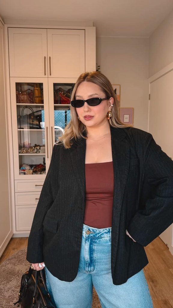 How to style an oversized blazer with a strapless top to show a little skin