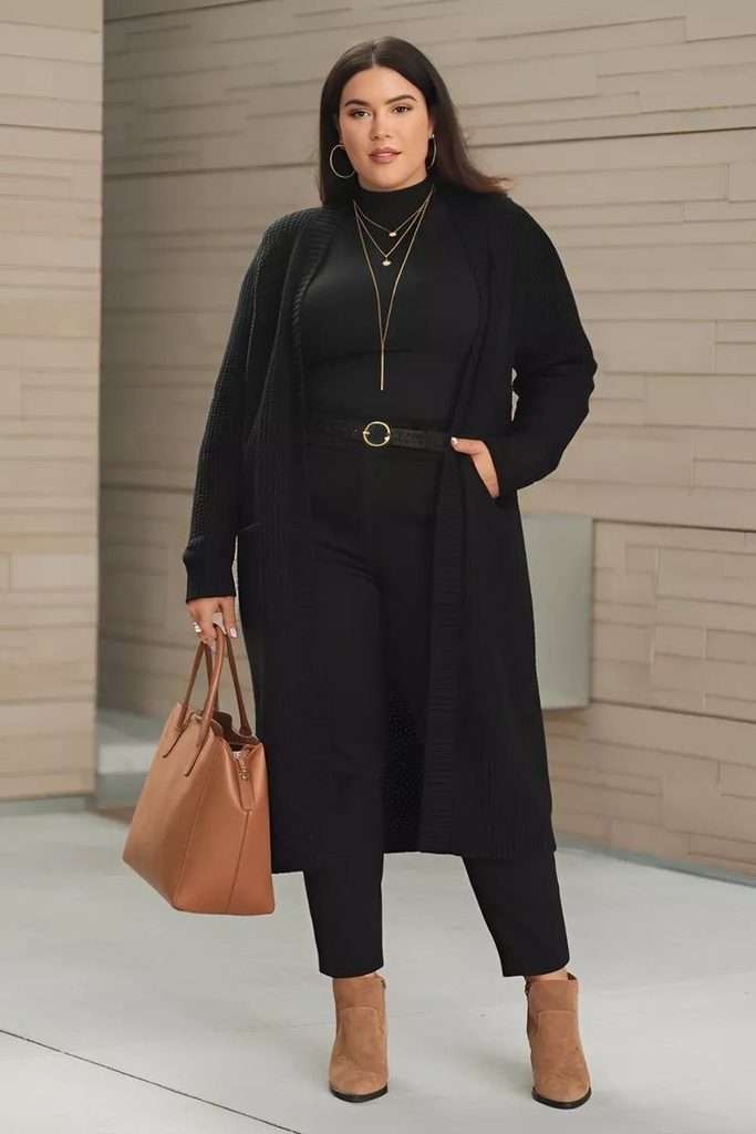 How to style black jeans with a long black cardigan, fitted black top, tan ankle boots, and brown handbag
