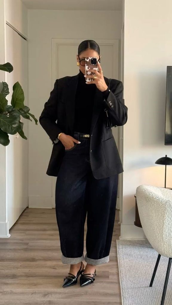 How to style black jeans with a black blazer, black top, and pointed-toe heels