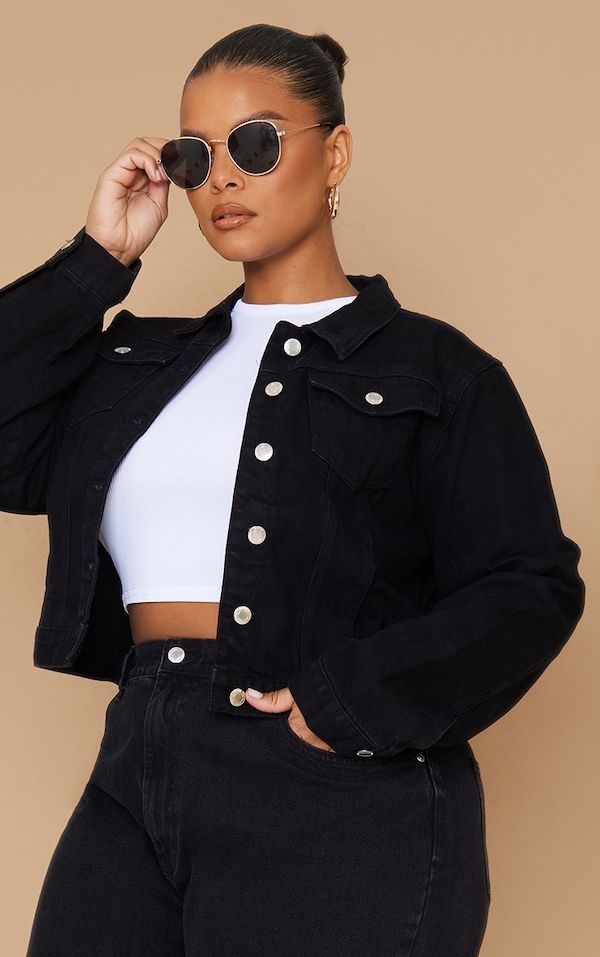 How to style black jeans with a cropped black denim jacket, white crop top, and sunglasses