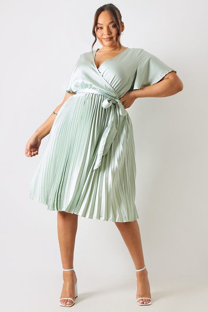 Sage green pleated midi dress for a wedding guest