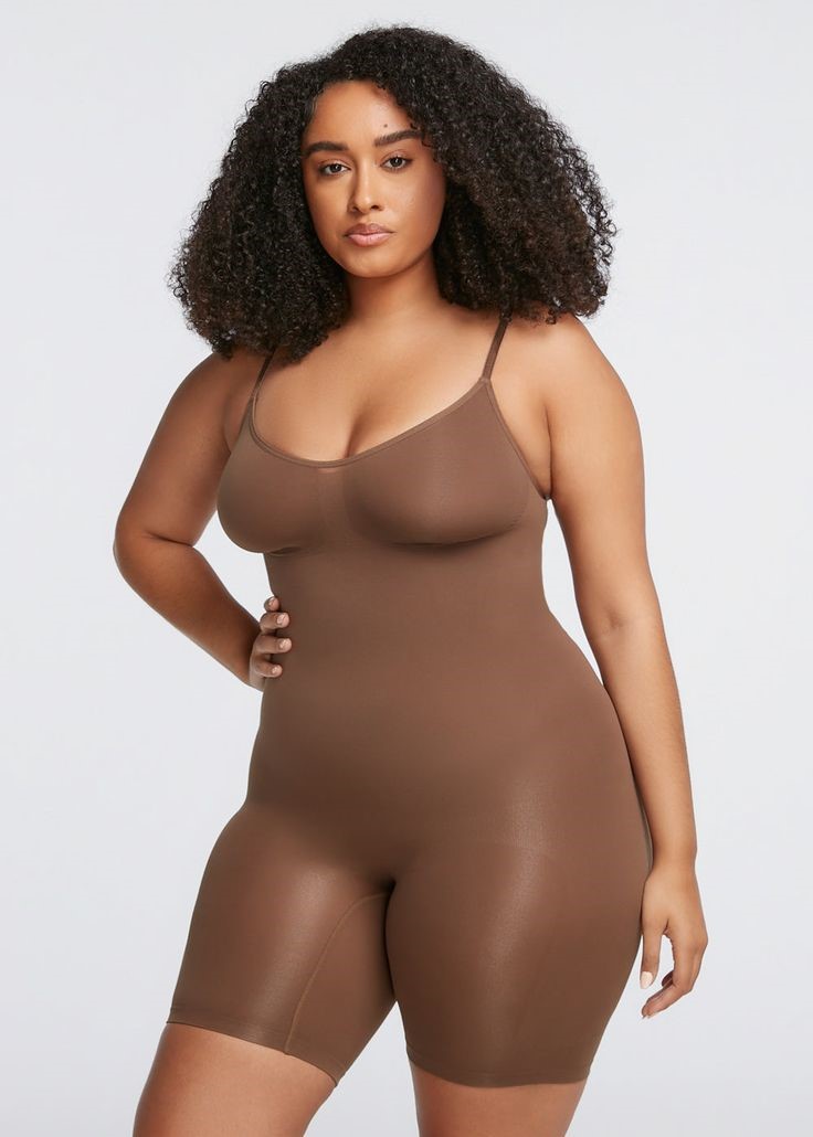 Plus size woman wearing a brown bodysuit for shapewear myths