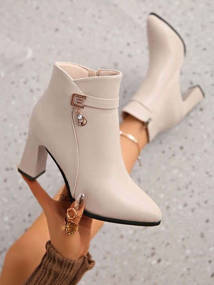 Shoes Every Plus Size Woman Should Own - cream pointed-toe ankle boots with block heels