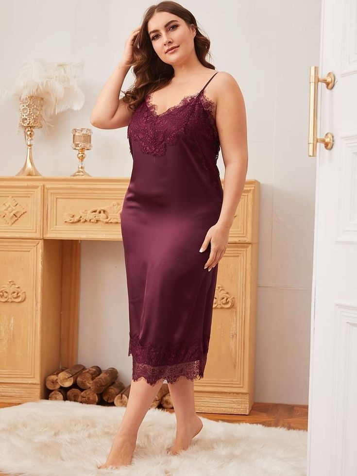 The Best Slip Dresses to Wear Under Clothing in a burgundy full-length style