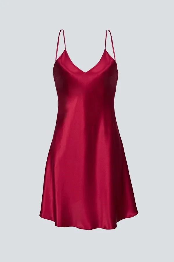 Red silk slip dress with thin straps and a smooth flowing fit