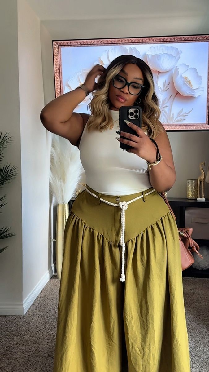 Plus size woman in a stylish outfit showing the confidence secret stylish women already know