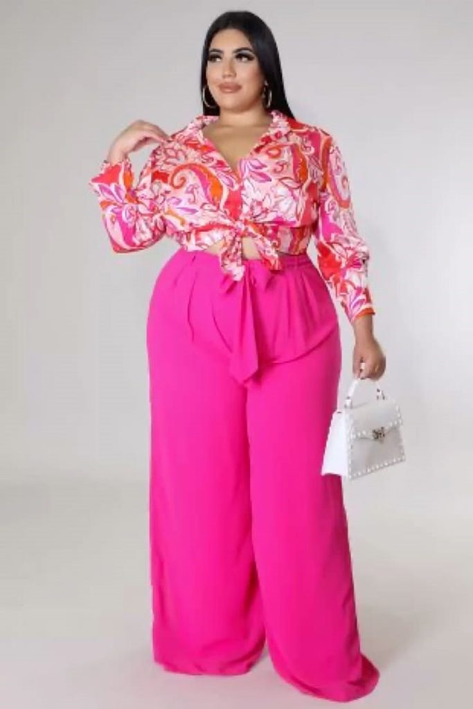 Things stylish plus size women never apologize for: wearing a bold pink outfit