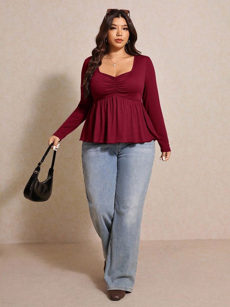 Things stylish plus size women never apologize for: wearing a well-fitted burgundy top