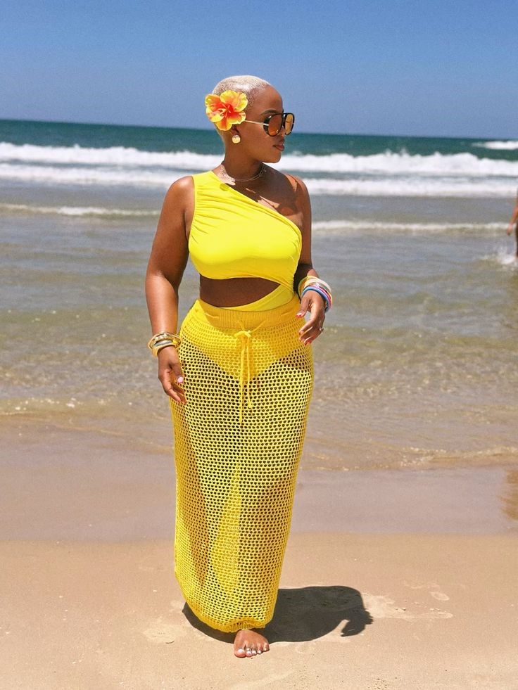 Beach Cover-Up Ideas You'll Wear All Vacation featuring a yellow crochet maxi skirt over matching swimwear