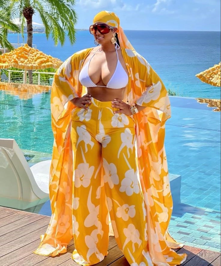 Beach Cover-Up Ideas You'll Wear All Vacation featuring a yellow floral wide-leg beach pants set