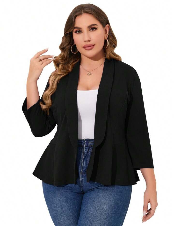 Plus size woman wearing a classic black blazer with jeans